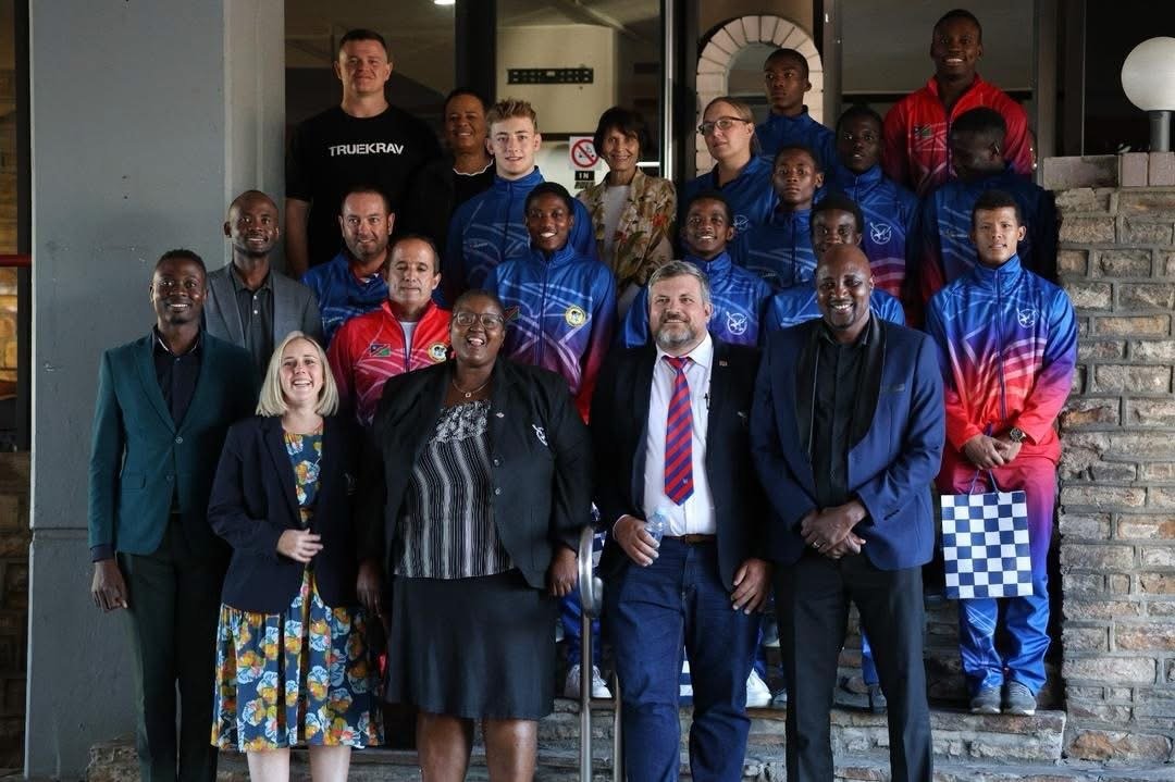 Francois with a group of athletes and supporters