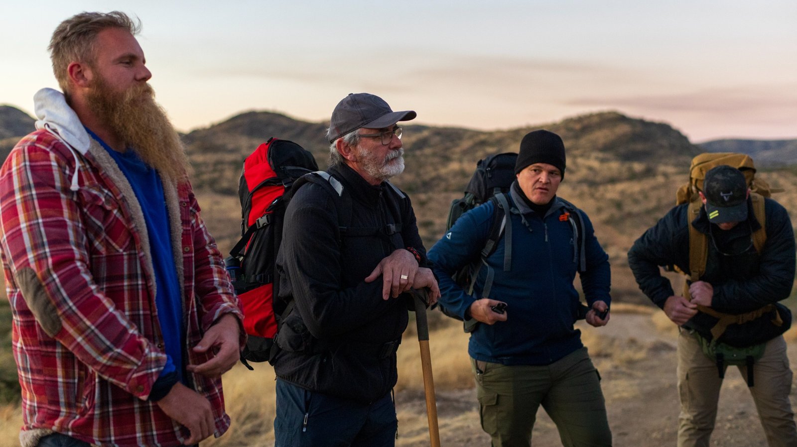 Hiking companions with backpacks in the Namibian landscape